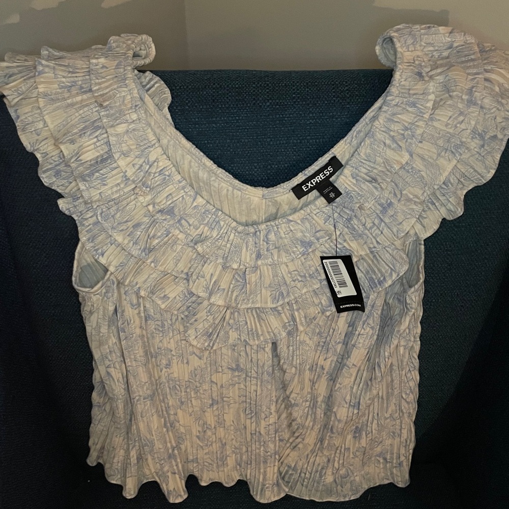 Ruffled sleeveless blouse